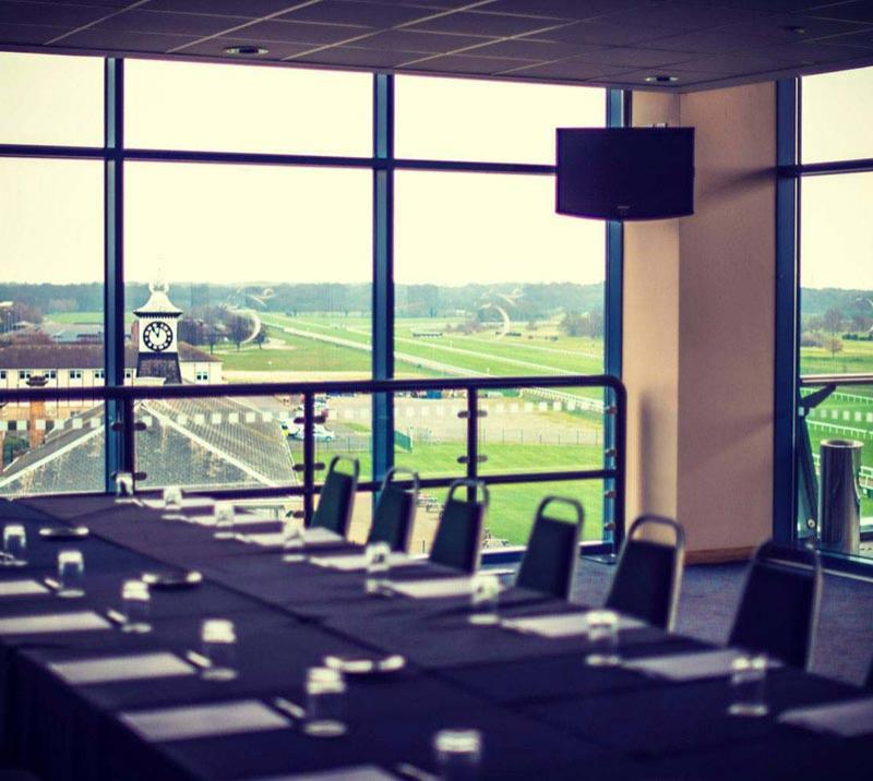 A suite at Doncaster Racecourse configured for a meeting