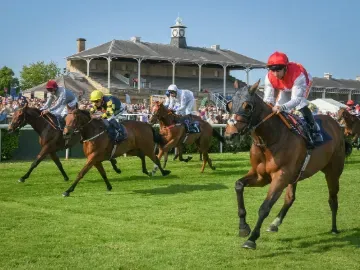 Horses running on the track at Doncaster Racecourse 