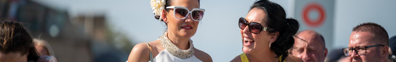 Two ladies enjoying the racing at Doncaster Racecourse