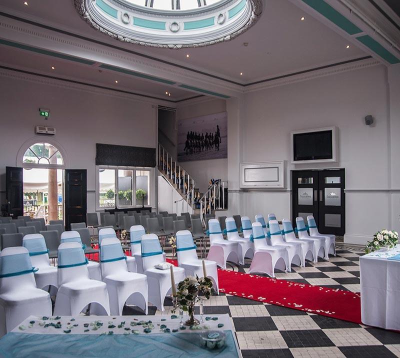 The Old Weighing Room interior prepared for a Wedding Service.