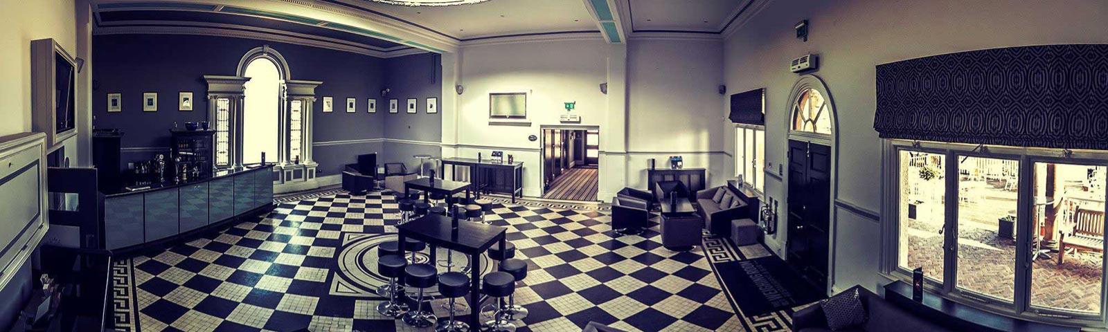 The interior of the Old Weighing Room at Doncaster Racecourse.  A 1920s style bar.