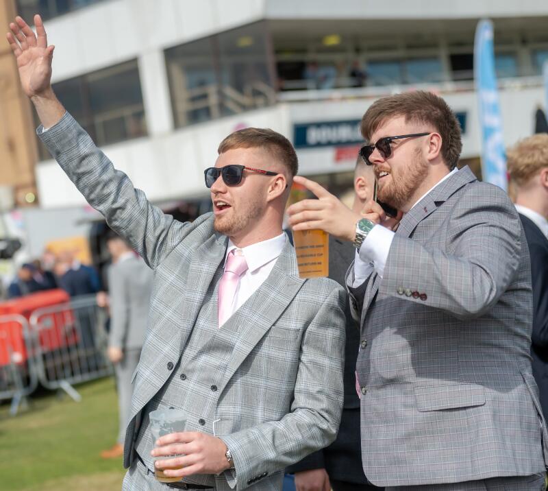 Two guys cheering at Doncaster Races